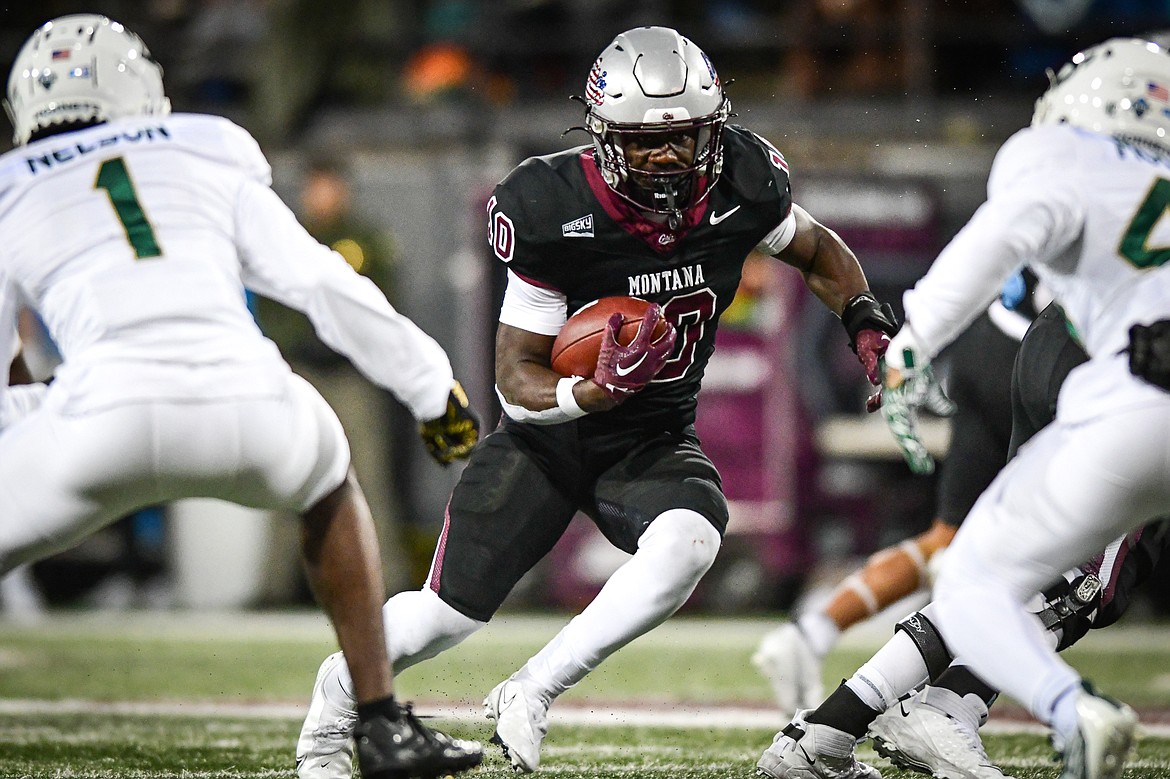 Grizzlies running back Eli Gillman (10) looks for running room in the first quarter against Sacramento State at Washington-Grizzly Stadium on Saturday, Nov. 4. (Casey Kreider/Daily Inter Lake)