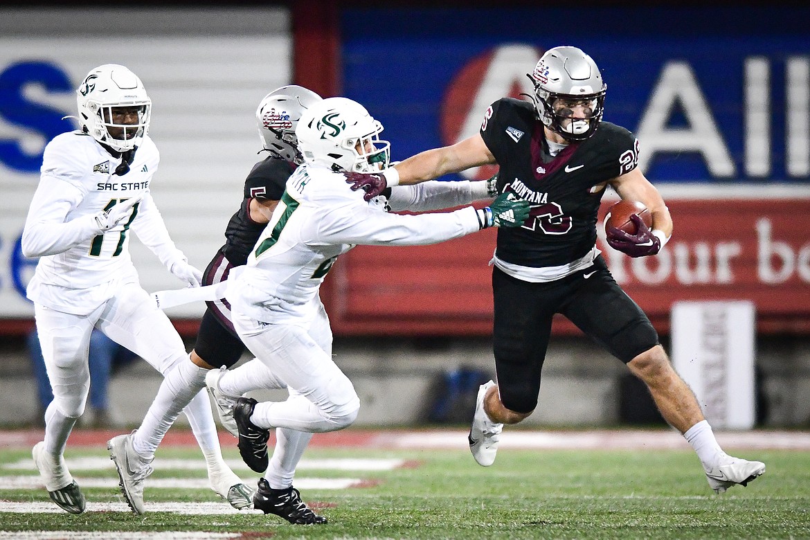 Grizzlies running back Nick Ostmo (26) picks up yardage on a run in the second quarter against Sacramento State at Washington-Grizzly Stadium on Saturday, Nov. 4. (Casey Kreider/Daily Inter Lake)