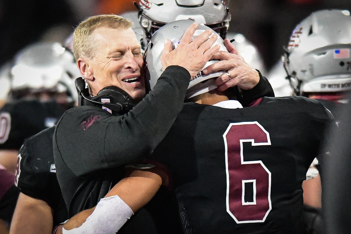Grizzlies head coach Bobby Hauck hugs wide receiver Keelan White (6) after White's 97-yard touchdown reception in the fourth quarter against Sacramento State at Washington-Grizzly Stadium on Saturday, Nov. 4. (Casey Kreider/Daily Inter Lake)