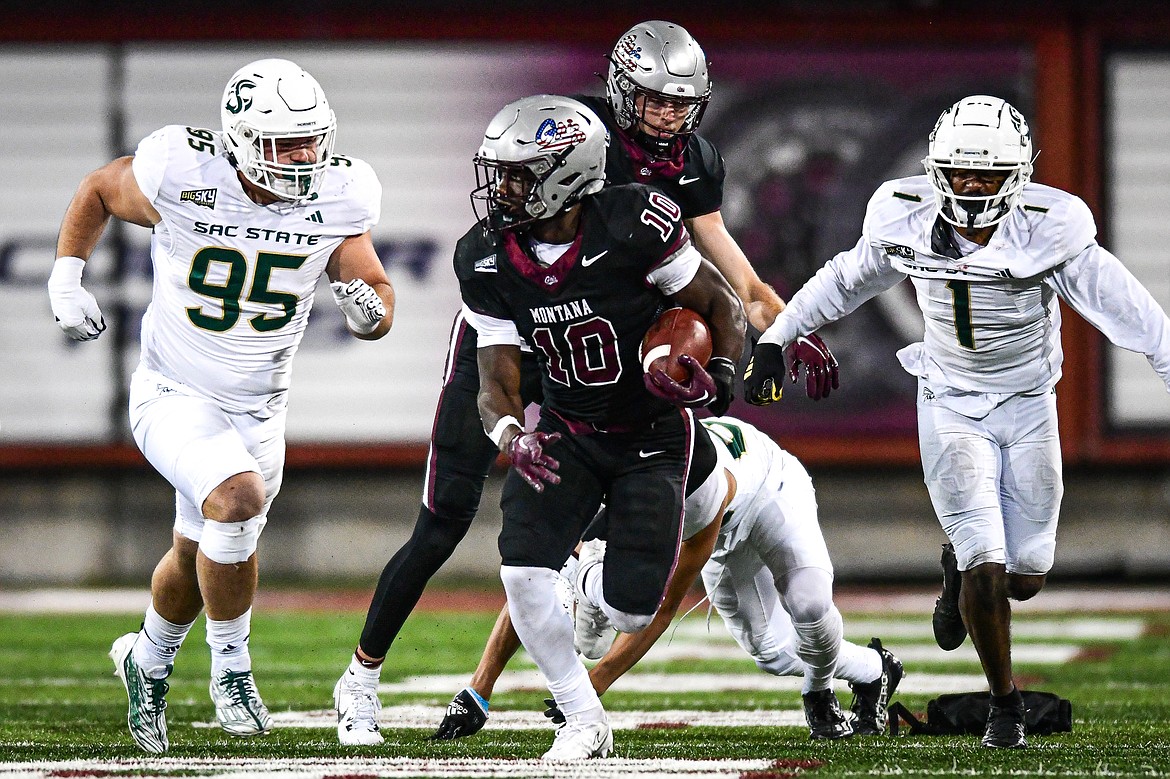 Grizzlies running back Eli Gillman (10) picks up yardage on a run in the fourth quarter against Sacramento State at Washington-Grizzly Stadium on Saturday, Nov. 4. (Casey Kreider/Daily Inter Lake)