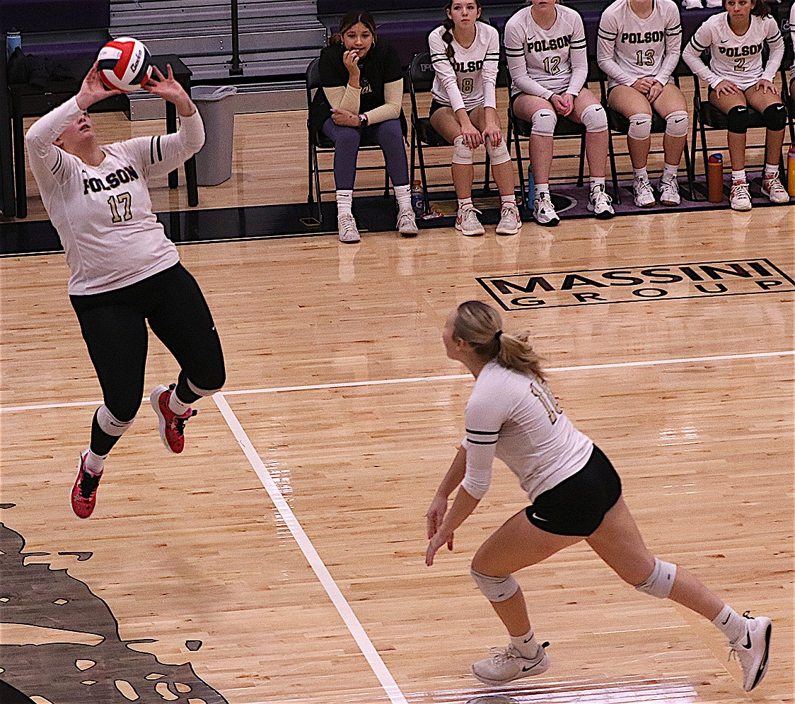 Lady Pirate Avery Staff sets to Carli Maley during the Divisional Tournament in Polson. The Pirates won one and lost two during last week's state tournament in Bozeman – their third in a row. (Bob Gunderson photo)