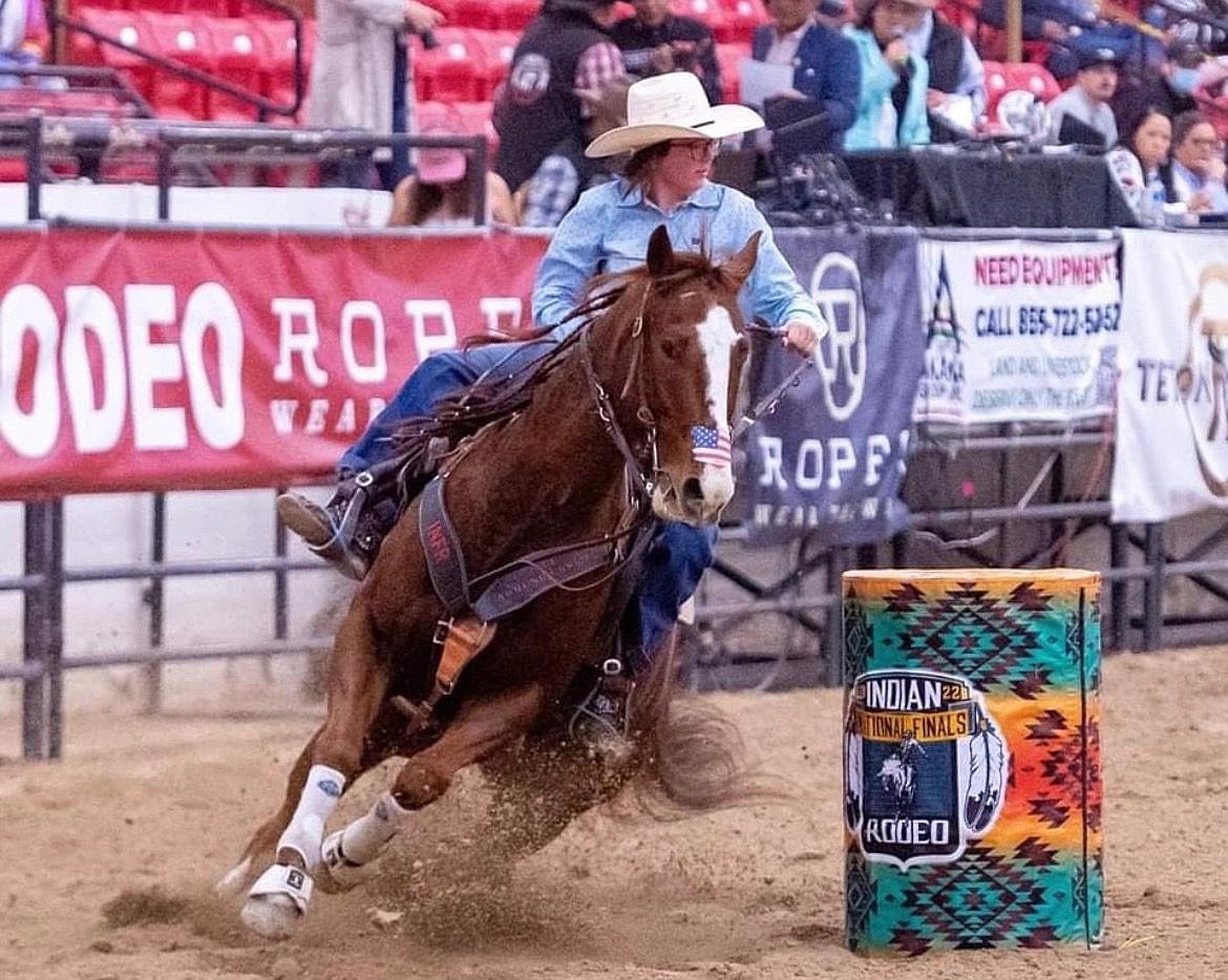 Arlee's Graysen O'Connor rounds the barrels at the 2003 Indian National Finals Rodeo in Las Vegas, where she won both junior and senior divisions.