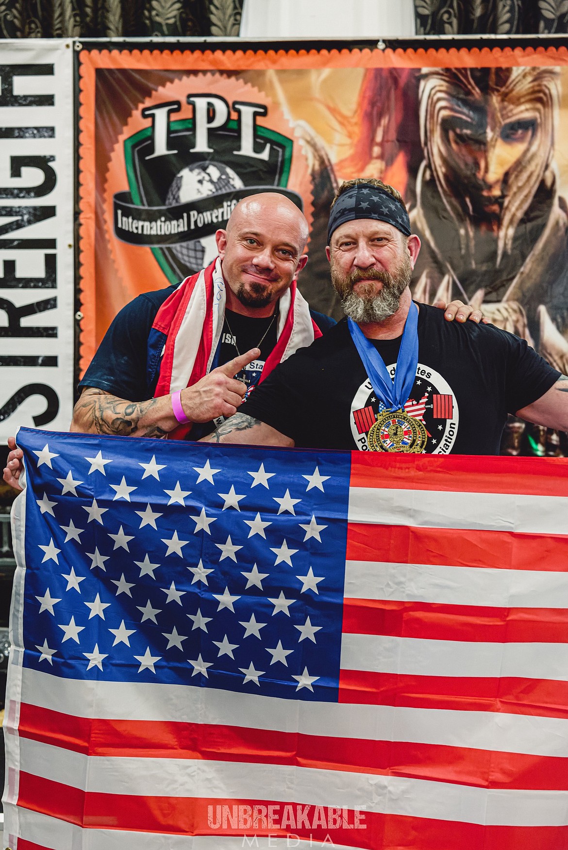 Team USA Coach Kyle Kyle Young with Lake County Sheriff's detective Scott Sciaretta at the International Power Lifting World Championships in England, where Sciaretta earned first place in three different events.