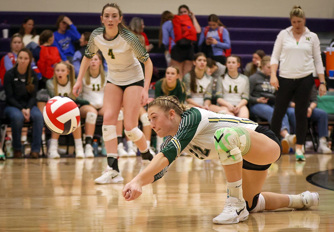 Brooke Zetooney makes a diving play on the ball during action at the Western A Divisional Volleyball Tournament in Polson Thursday. (Jeremy Weber/Bigfork Eagle)