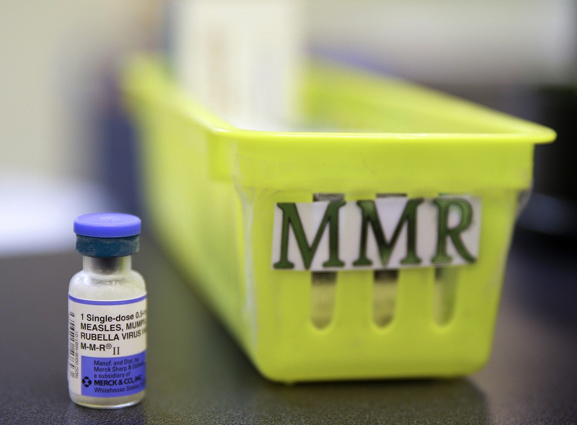 This Feb. 6, 2015, file photo shows a Measles, Mumps and Rubella, M-M-R vaccine on a countertop at a pediatrics clinic in Greenbrae, Calif. (AP Photo/Eric Risberg, File)