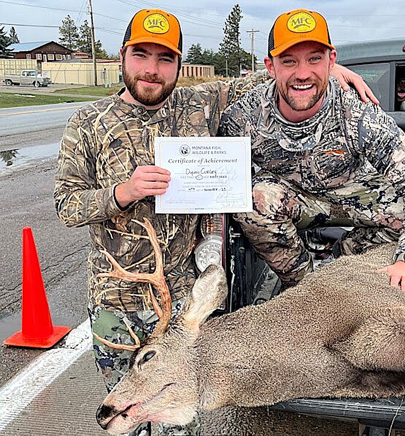 Dylan Curley shows off a mule deer buck he bagged in Montana. (Photo courtesy Montana FWP)