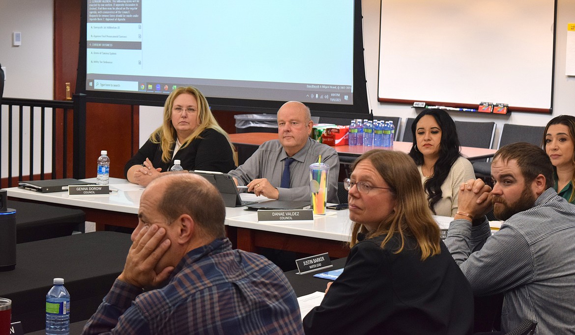 Othello City Council members and city of Othello staff listen to the Greater Othello Chamber of Commerce as they update the council during the public comment portion of Monday’s council meeting.