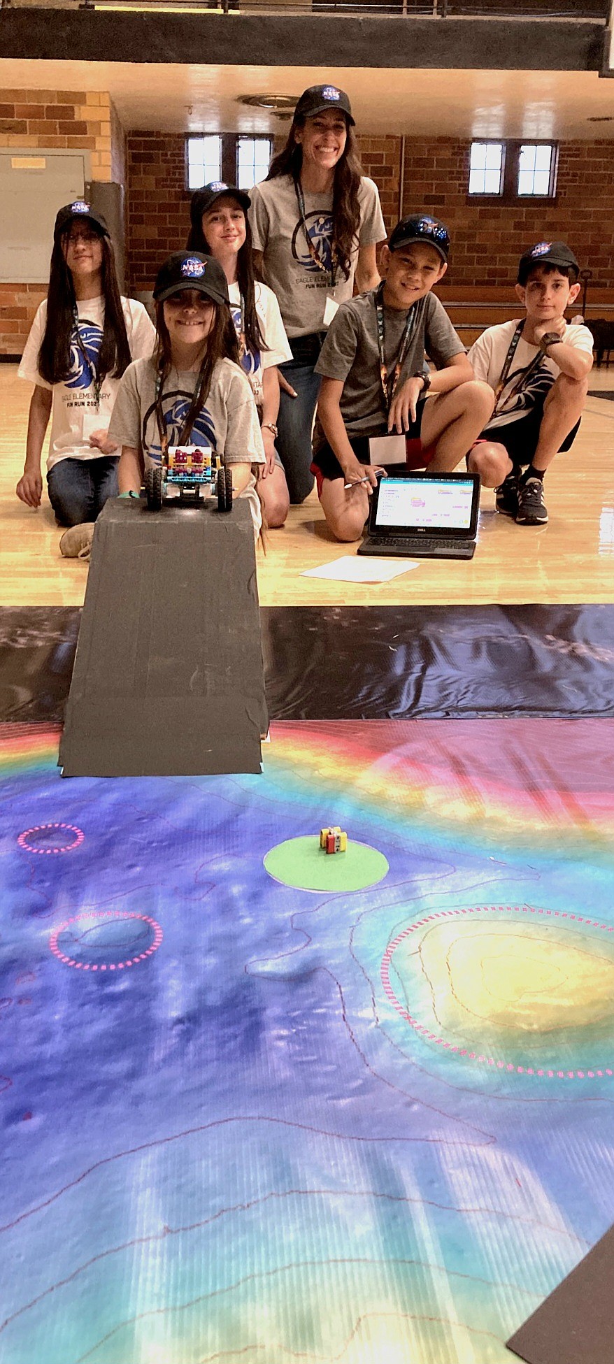 At a challenge event held at the University of Idaho last June, students demonstrated their ability to navigate their rover down into a simulated crater, around various obstacles, and back up a steep ramp to exit, advisor Heather Heyer Moremen said.