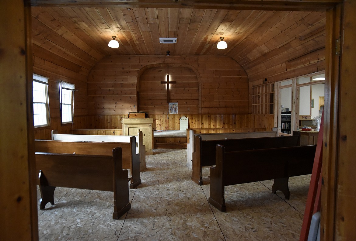 The old sanctuary at Lakeside Community Chapel's old sanctuary Saturday, Oct. 28, 2023. The space is being renovated, revealing  original wood paneling, wainscoting and floor joists, which is thought to be from old-growth trees. The renovated space will be used to hold youth Sunday services. (Hilary Matheson/Daily Inter Lake)