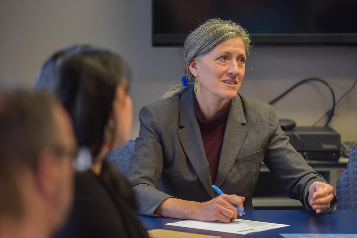 Monica Tranel, a Democrat from Missoula running against Republican Rep. Ryan Zinke in the race for Montana's 1st Congressional District, speaks with housing officials in the Flathead Valley during a roundtable discussion. (Kate Heston/Daily Inter Lake)