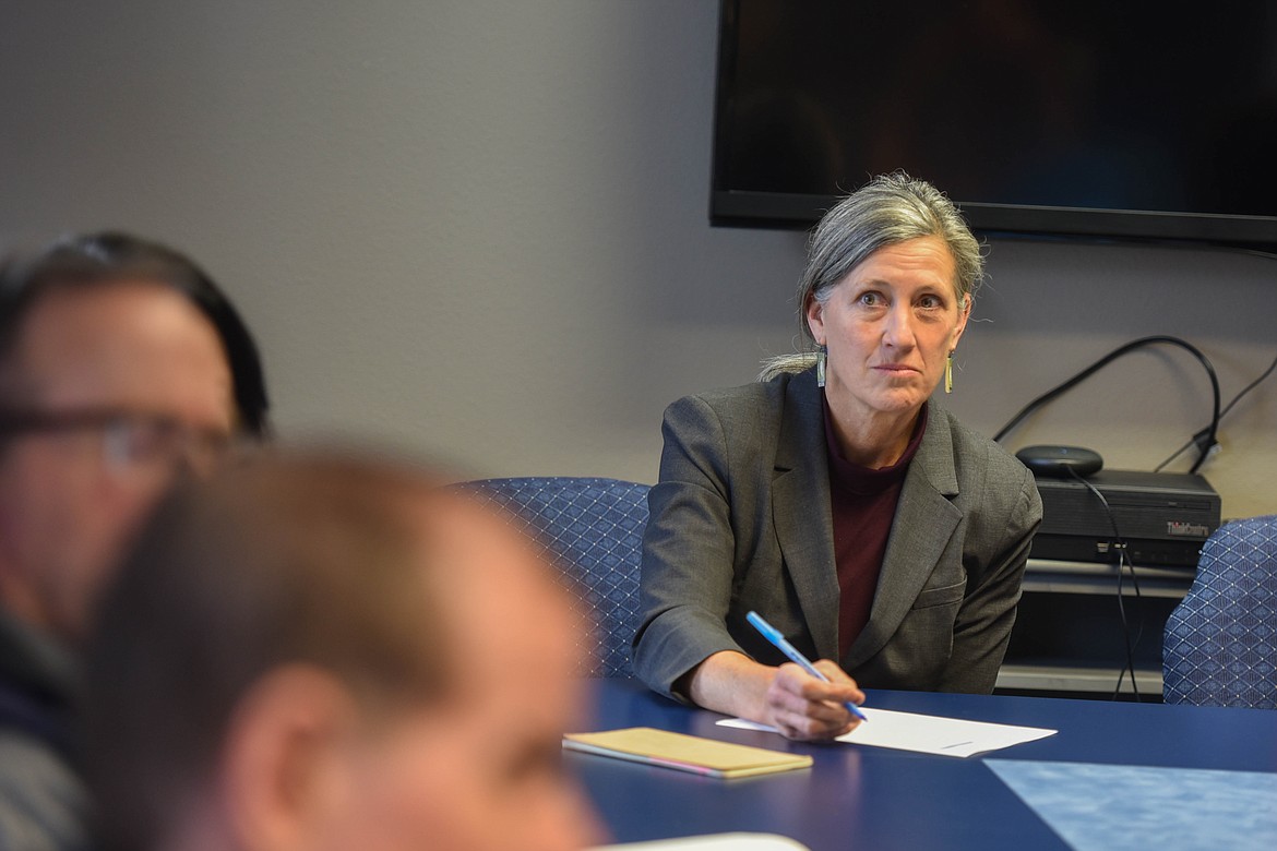 Monica Tranel, a Democrat from Missoula running against Republican Rep. Ryan Zinke in the race for Montana's 1st Congressional District, speaks with housing officials in the Flathead Valley during a roundtable discussion. (Kate Heston/Daily Inter Lake)