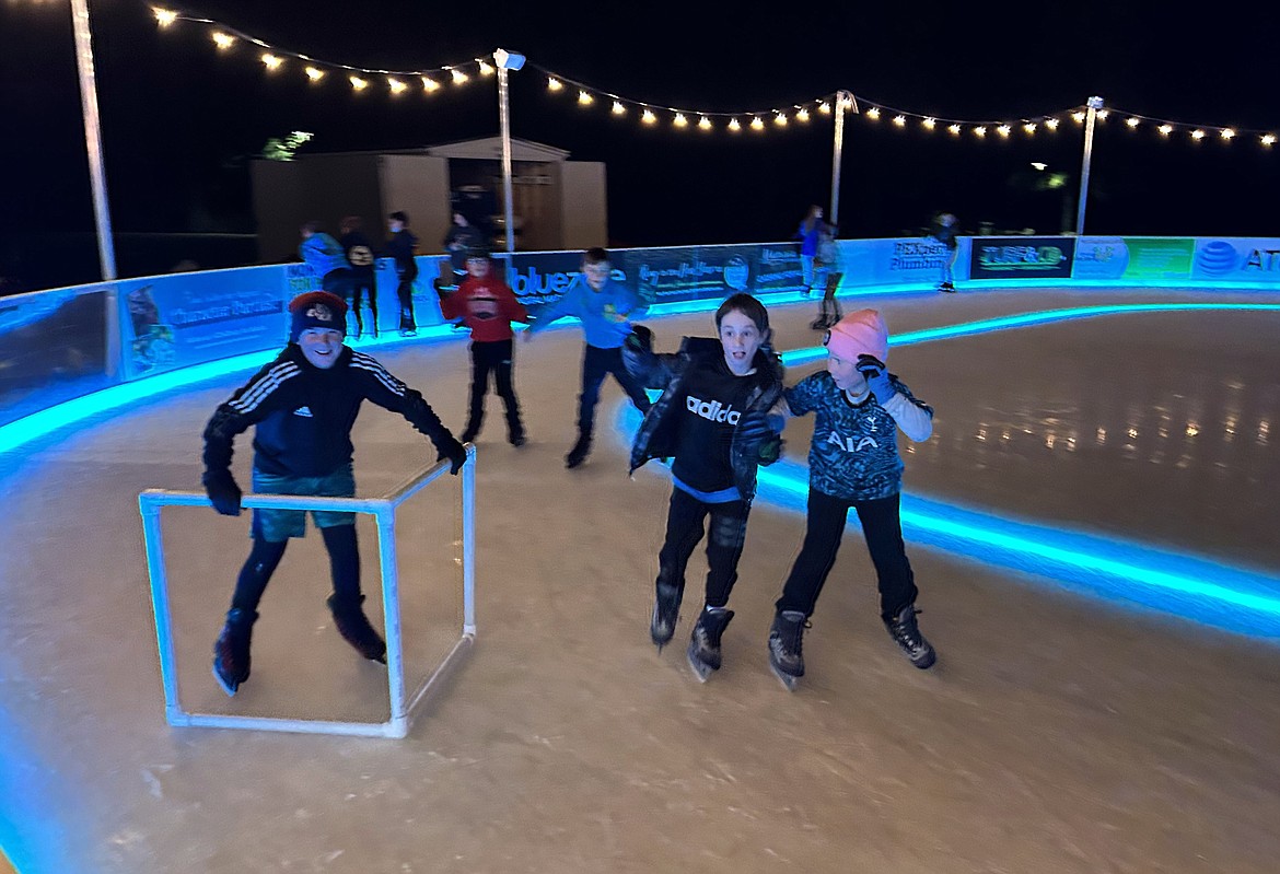 Ice skaters have fun at Coeur d'Alene on Ice at McEuen Park on Wednesday. The ice rink is open daily through mid-January.