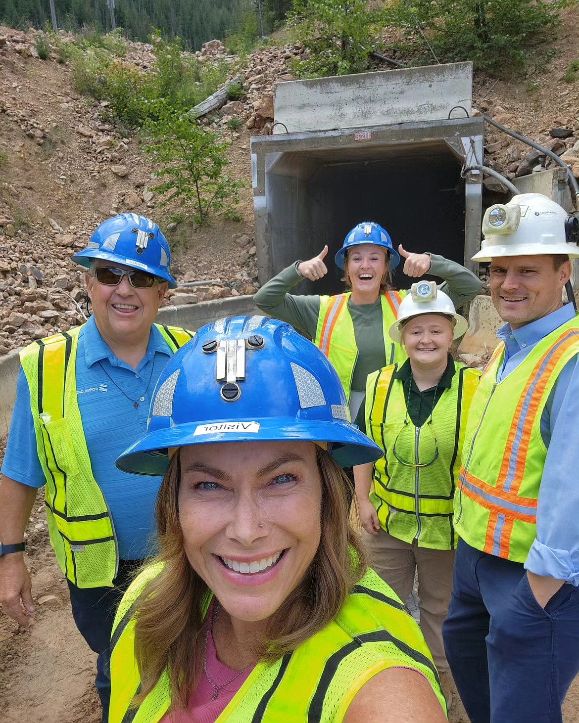 From left: Silver Valley Economic Development Director Paige Olsen; Tom Francis, GM; Morgan Hill, environmental manager; as well as Jenny Hemley from Idaho Commerce and George Baily of RENO (Hydrogen Energy) visit the Russell mining portal before demolition at the Bunker Hill Mine site in Wardner.