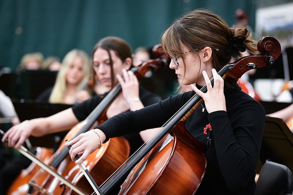Members of the Whitefish High School Band and Orchestra play Armed Forces Salute at the Veterans Day Community Event at Whitefish High School on Thursday, Nov. 9. (Casey Kreider/Daily Inter Lake)