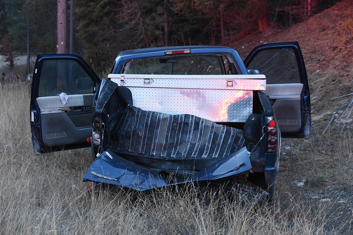 A GMC Sierra pickup truck was struck by a Ford F150 truck Thursday evening on U.S. 2 at the Hammer Cutoff Road intersection. (Scott Shindledecker/The Western News)