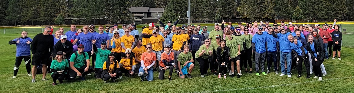 All of the teams in the Kickin’ it Forward kickball tournament pose at Ramsey Park. Through the event, the Coeur d’Alene Regional Realtors Young Professionals Network was able to raise $4,500 for Camp Journey NW, funding several getaway camp experiences for local children battling cancer.
