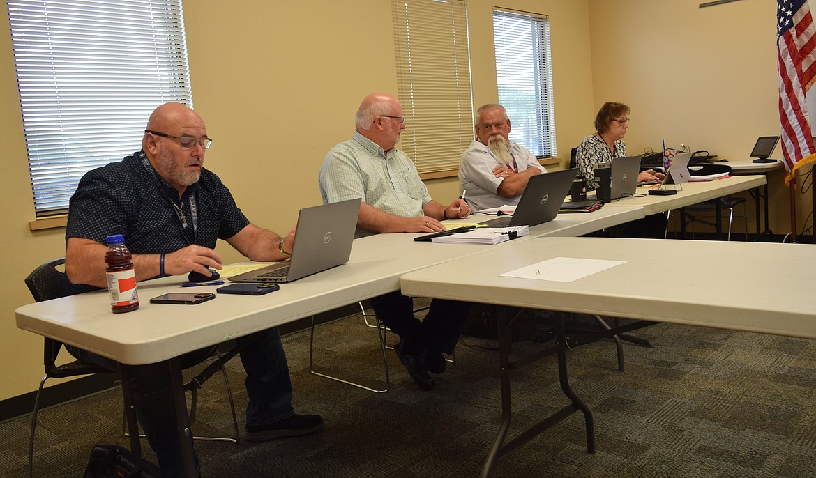 From left to right, Adams County Commissioners Mike Garza, Dan Blankenship and Jay R. Weise hold a commissioners meeting in June at the Adams County District Court building in Othello.