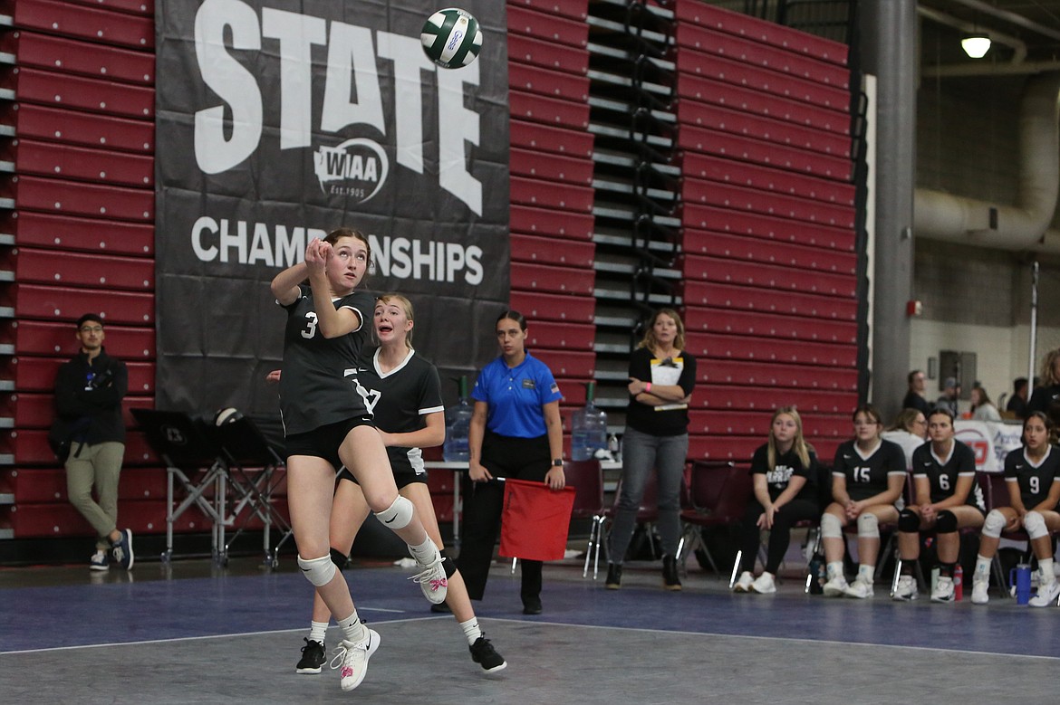 Almira/Coulee-Hartline junior Emma Whitaker performs a dig against Mount Vernon Christian in the first round of the 1B State Volleyball Tournament.