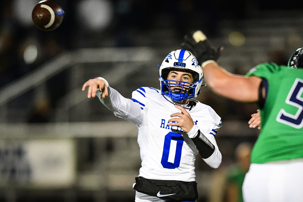 Gallatin quarterback Reese Dahlke (0) drops back to pass in the first quarter against Glacier in the Class AA semifinals at Legends Stadium on Friday, Nov. 10. (Casey Kreider/Daily Inter Lake)