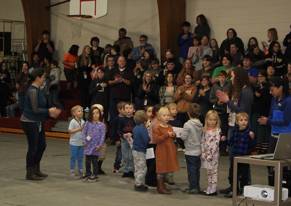 Each class at Alberton School read or recited a message of thanks to the veterans who had assembled in their gymnasium. Some gave thank you cards and even hugs were seen at their Veterans Ceremony. (Monte Turner/Mineral Independent)