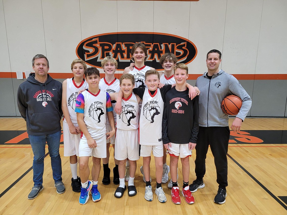 The Sandpoint Future eighth grade boys finished second at the River City Basketball Tournament. Front row, left to right, Alec Lieuallen, Blake Bogadi, Colton Dickinson, and Asher Nieman. Back row, left to right, coach Doug Lieuallen, Dexter Williams, Rhiley Morris, Jamen Jensen, Mason Peters, and coach Paul Nieman.