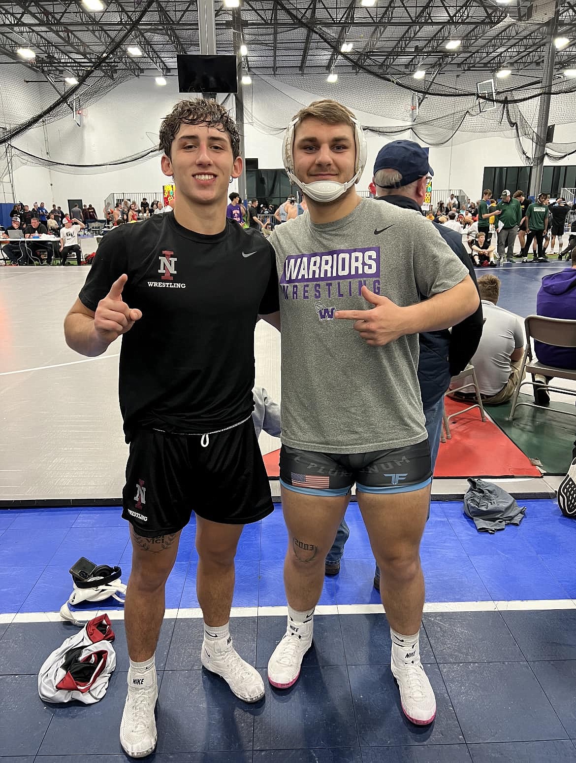 Bonners Ferry alumni Evan Barajas (left), who wrestles for North Idaho College, poses with fellow Bonners Ferry alumni, Jackson Rickter, who wrestles for Waldorf University (Iowa) at the Grand View Open wreslting tournament held at the Ignite Sports Complex in Grimes, Iowa this past weekend.