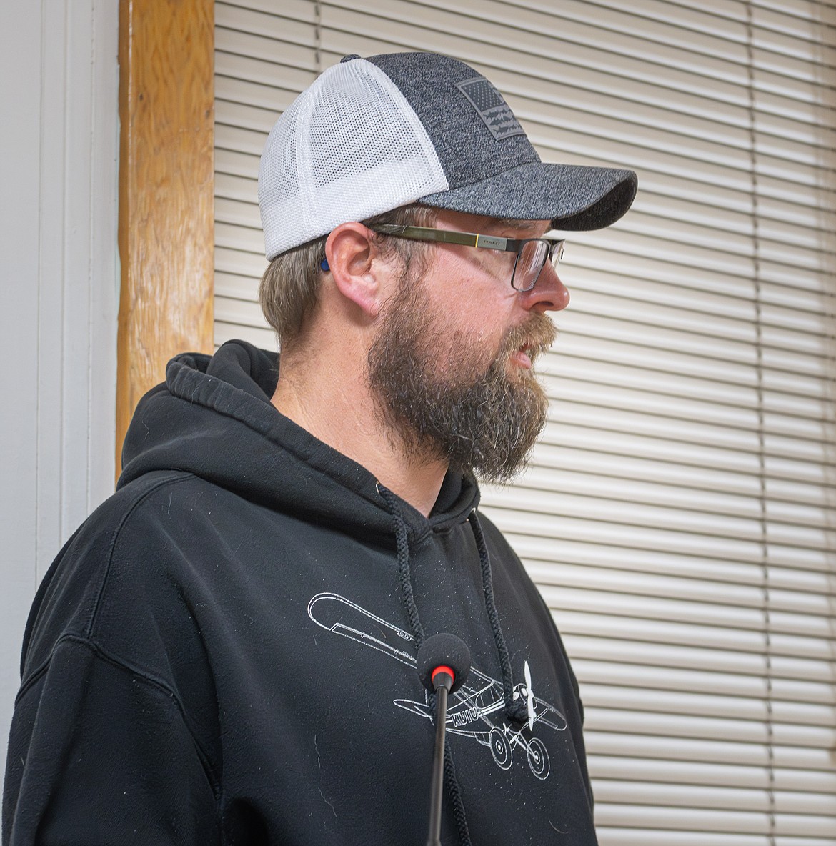 Josh Weedeman from Top Notch Construction speaks with the Plains Council last week. (Tracy Scott/Valley Press)