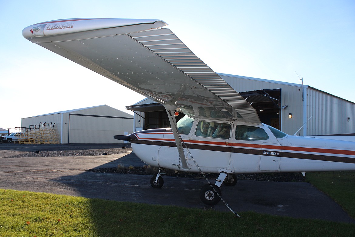 An aircraft outside a hangar at the Moses Lake Municipal Airport. City officials have approached Port of Moses Lake officials about assuming responsibility for the municipal airport.