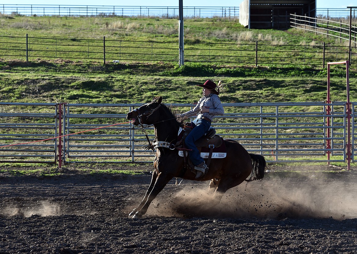 Zoey Bruyer's horse hits the brakes at roping practice. (Julie Engler/Whitefish Pilot)