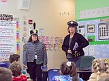 Elementary students learn veterans through military hats