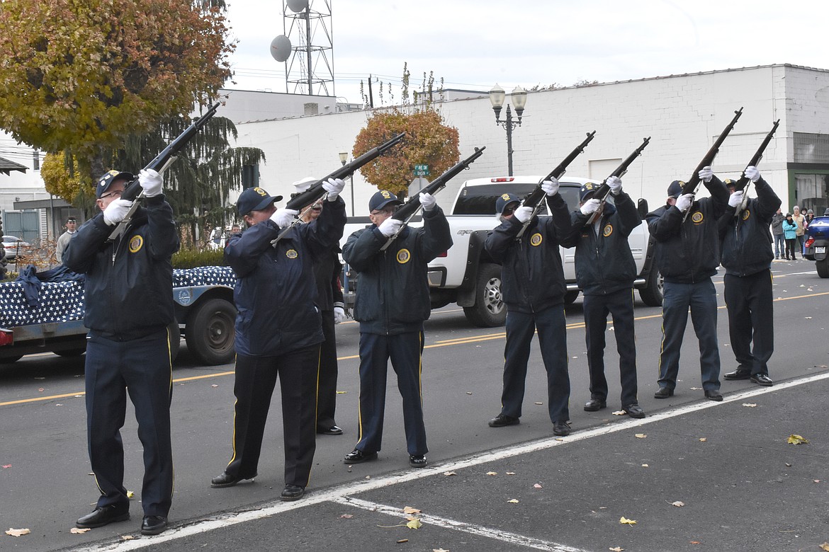 Riflemen from American Legion Post 28 in Ephrata and Post 209 in Moses Lake fire a 21-gun salute at precisely 11:11 a.m. at the Veterans Day parade in Ephrata Saturday.