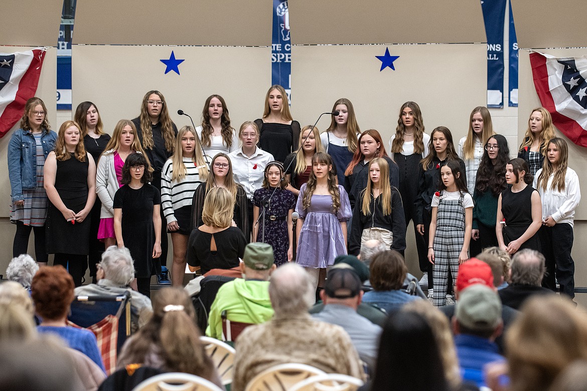 The Junior High Advanced Treble choir sings for the Veterans Day Assembly at Columbia Falls High School Thursday, Nov. 9.