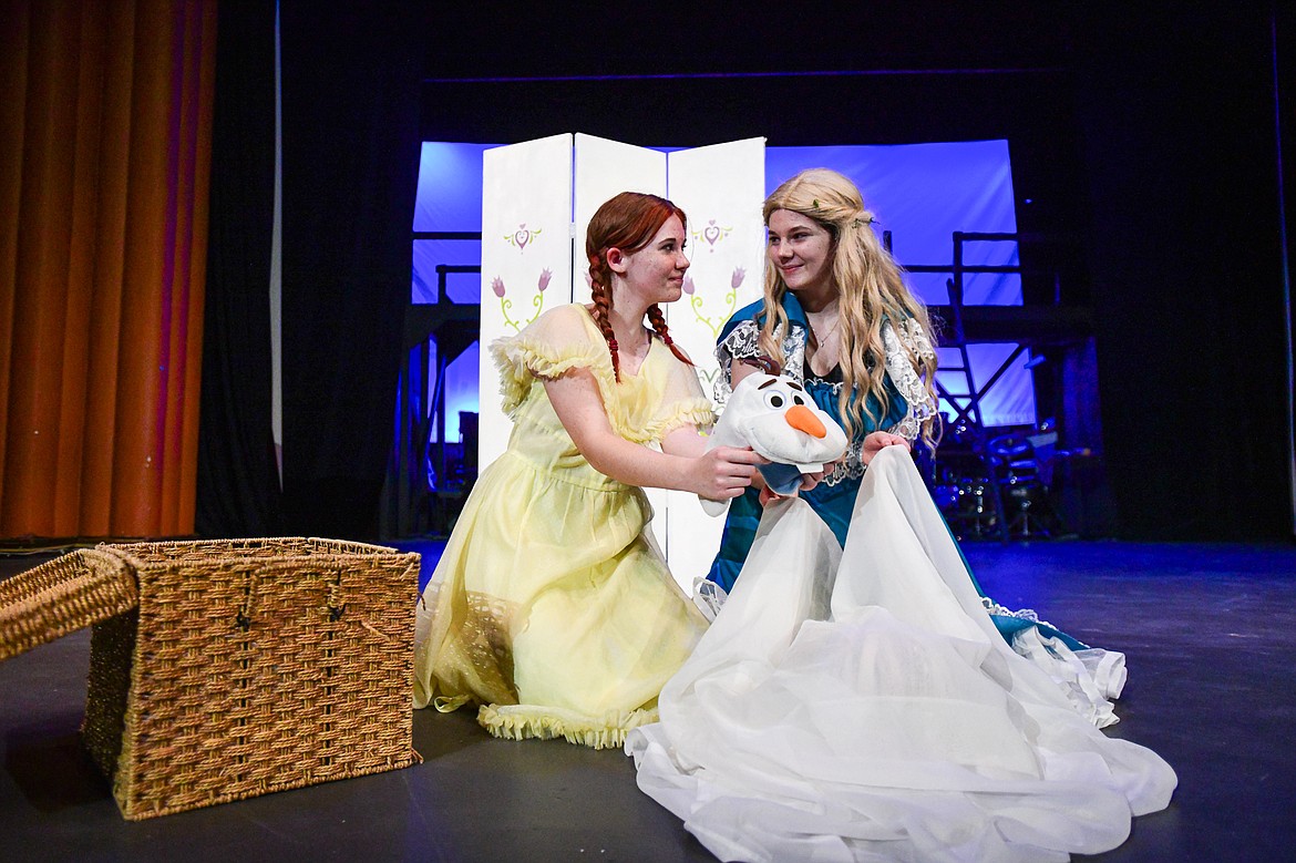 Flathead High School students rehearse a scene from the musical "Frozen" inside the auditorium on Tuesday, Oct. 24. Performing are Aubrie Mannon as Young Anna and Abigail O'Connell as Young Elsa.(Casey Kreider/Daily Inter Lake)