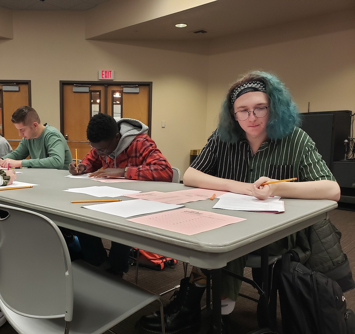 Cavin Cook begins work on a math test Tuesday to compete in the 40th annual North Idaho College Math Contest.