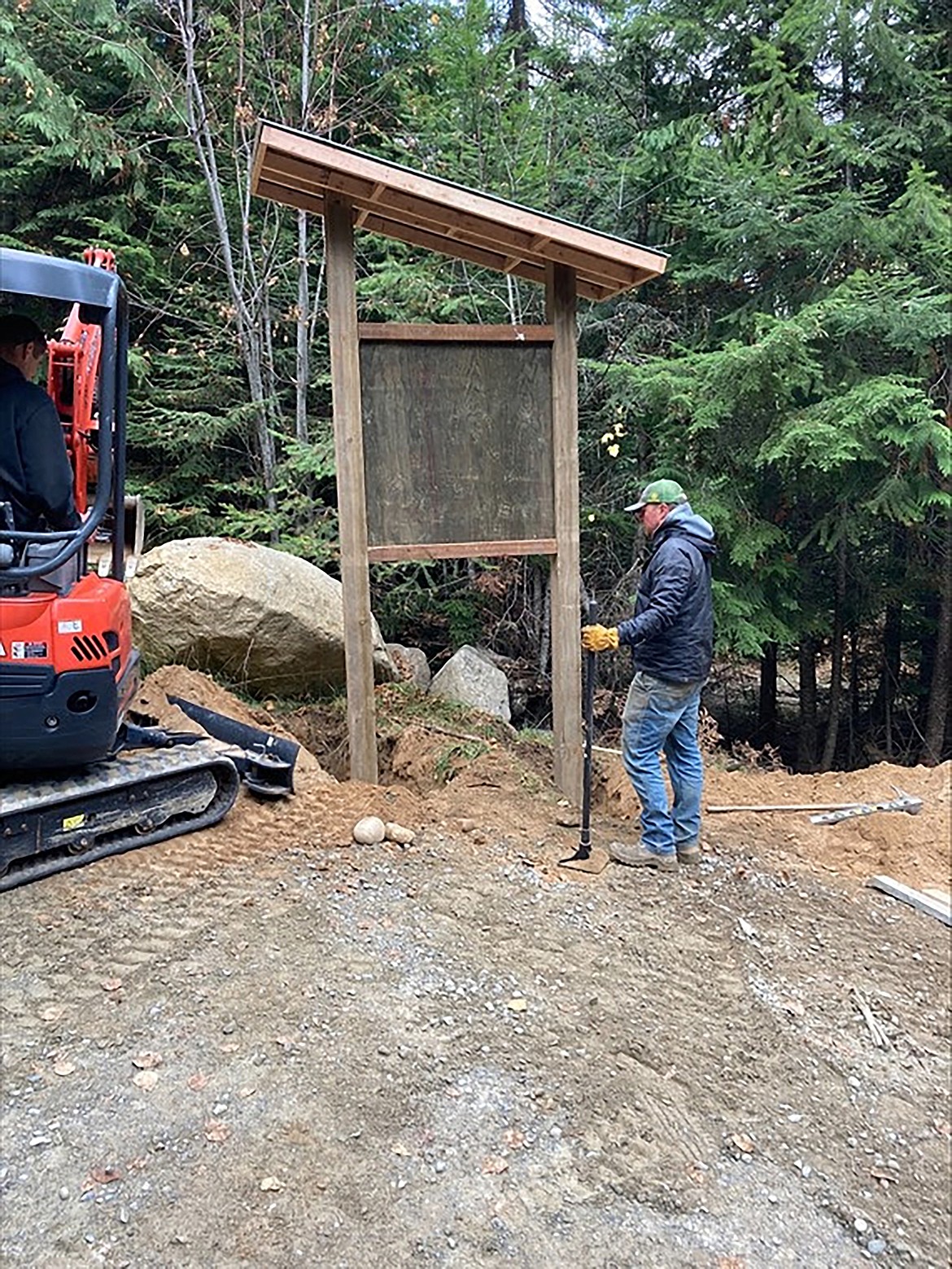 Sean Hanley, IDPR trail cat operator, is pictured during installation of the kiosk at Falls Creek road gate on Stimsom land.