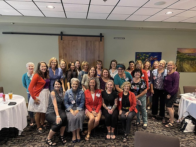 The women of the North Idaho chapter of the women-centered networking group Polka Dot Powerhouse gather for “Dot Days.”