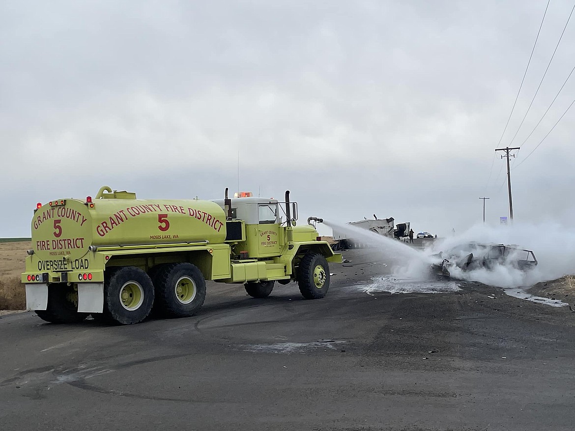 A Grant County Fire District 5 firefighting vehicle puts out a roadside fire after a vehicle collision east of Moses Lake. According to an announcement from the International Association of Fire Fighters, this week, from Nov. 13 to 17, is Crash Responder Safety Week.
