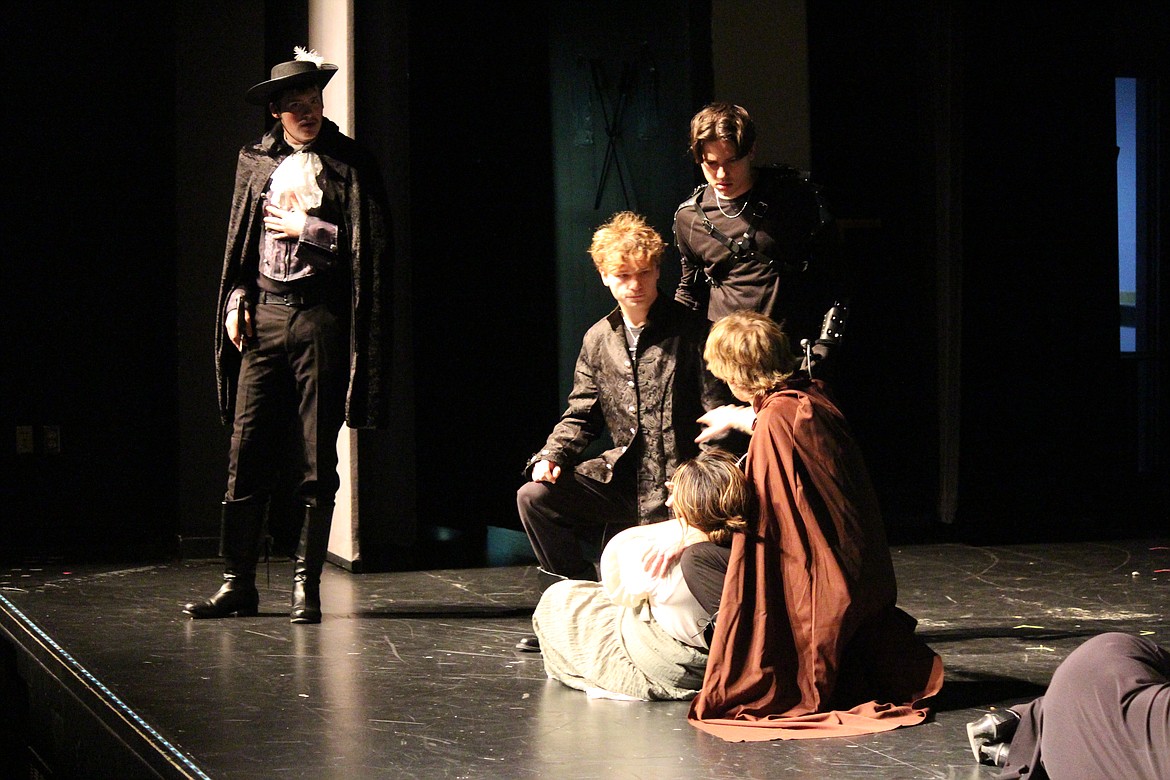 The Three Musketeers (standing, from left, Andrew Rowley, Noah Carlile and Jaxson Duran) arrive just in time to help D’Artagnan (Beck Ashton, front) save his sister Sabine (Llayleni Fuentes).