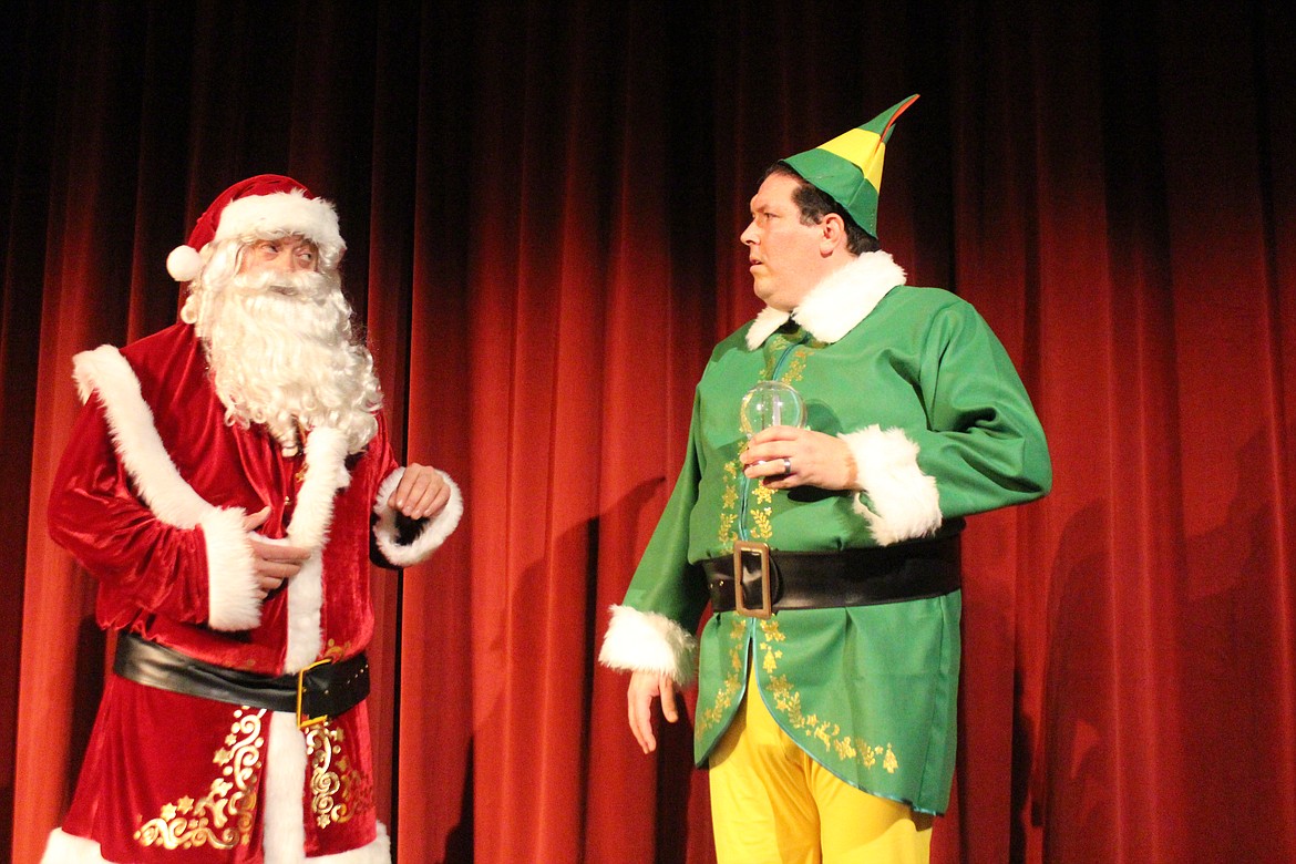 Santa (Jeremy Hansen, left) breaks it to Buddy (Clark Dalton, right) that his long-lost dad is on the Naughty List. The Masquers Theatre production of “Elf: The Musical” opens Nov. 25.