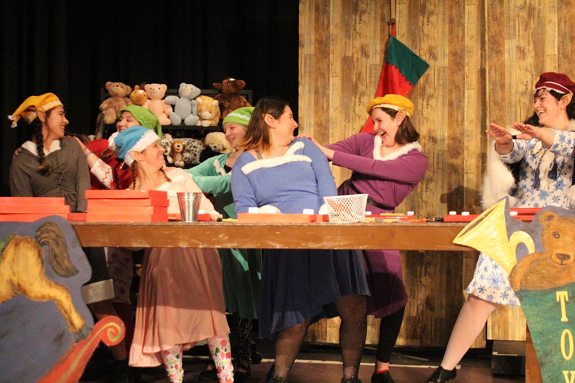 The elves are having a grand time making toys in the Masquers Theater production of “Elf: The Musical.”