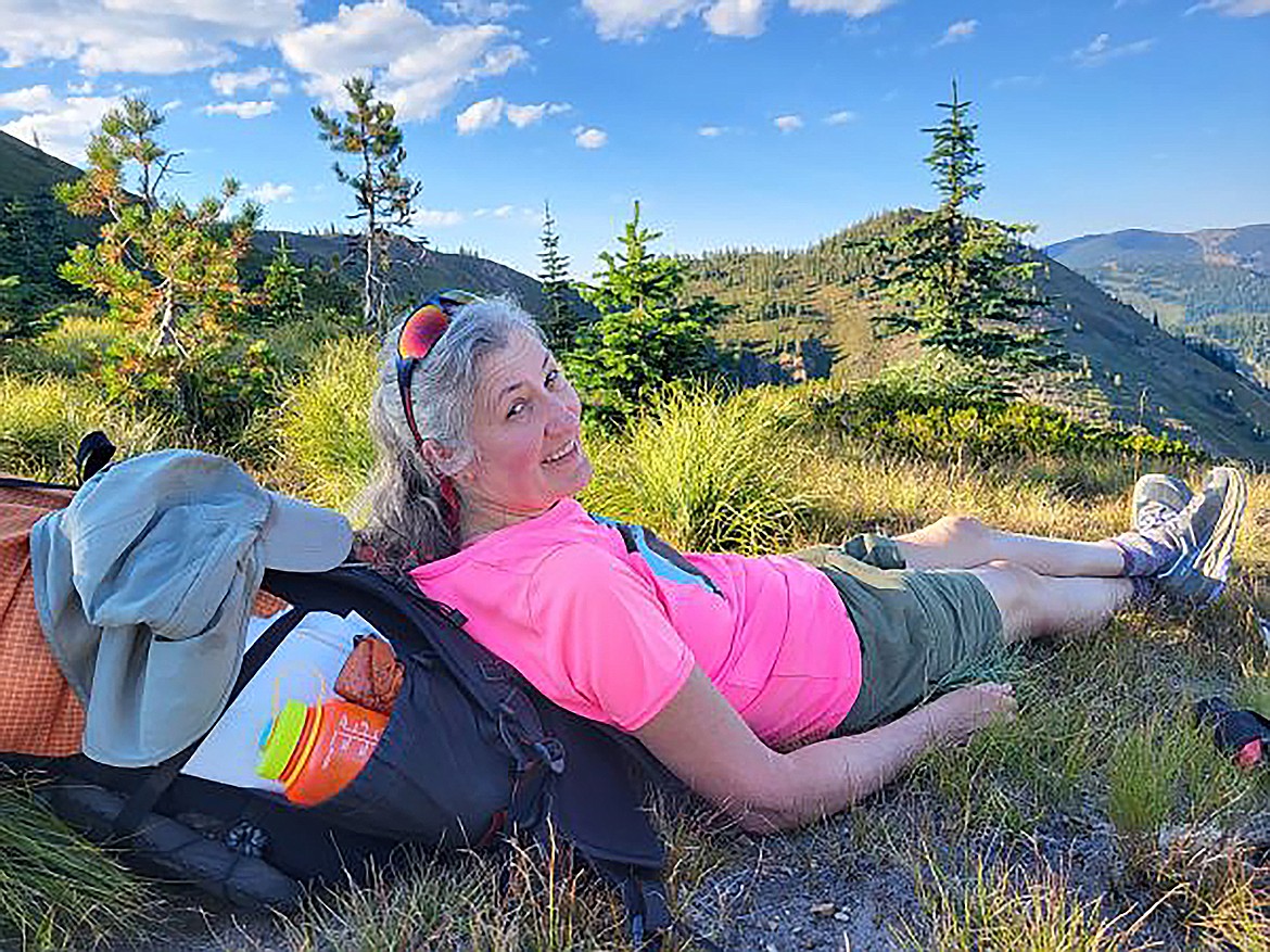 Deb Hunsicker is pictured relaxing while taking a break during a recent hike.