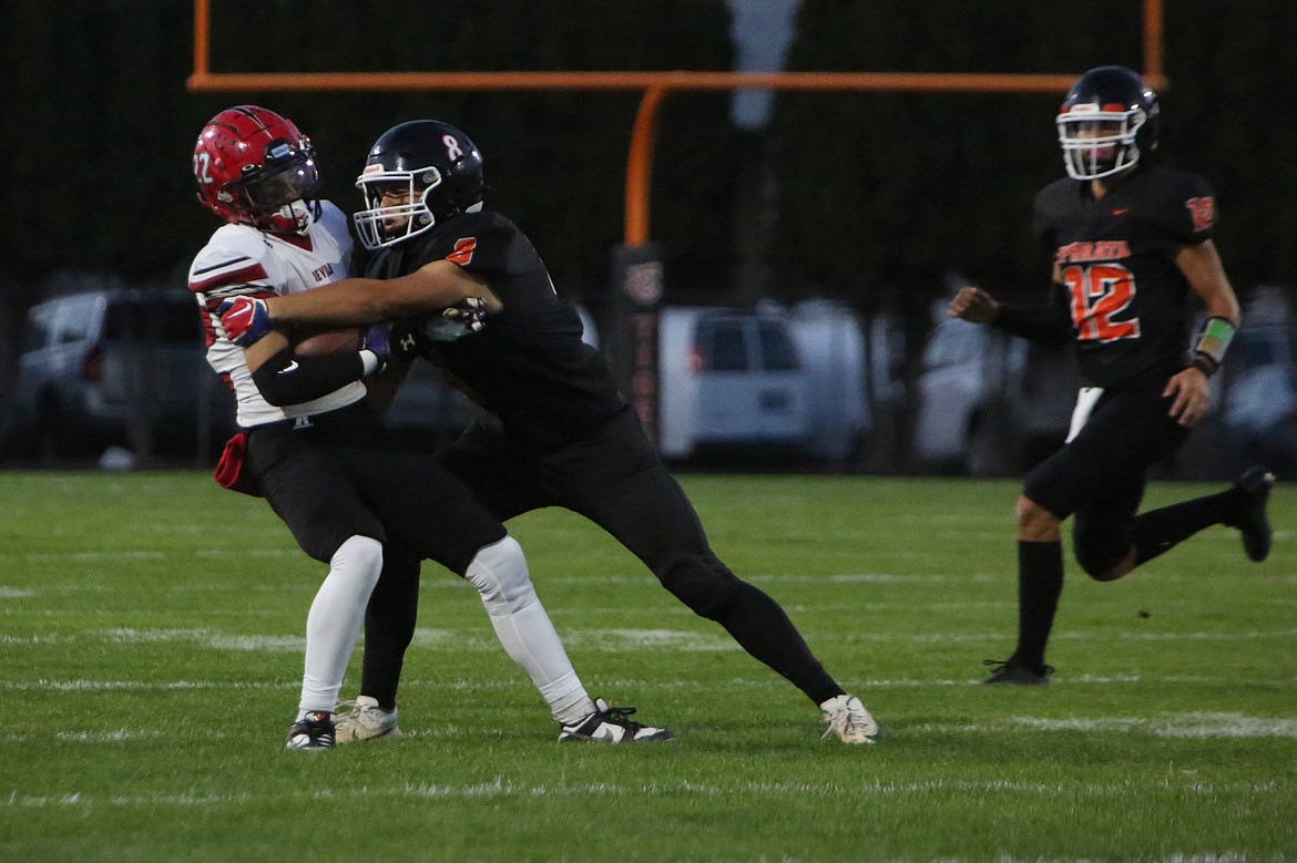 Ephrata sophomore Calvin Lybbert makes a tackle against East Valley (Yakima) on Sept. 22.