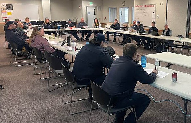 First responders and other officials meet in Quincy Tuesday to discuss contingency plans in the event of a train collision resulting in a hazardous materials release. The exercise was hosted by the Grant County Local Emergency Planning Committee which is managed by Grant County Sheriff’s Emergency Management Division. Attendees included representatives from fire agencies, law enforcement, emergency medical services, the Multi-Agency Communications Center, the National Weather Service, local industries, public health, and hospitals, according to the Grant County Sheriff’s Office.