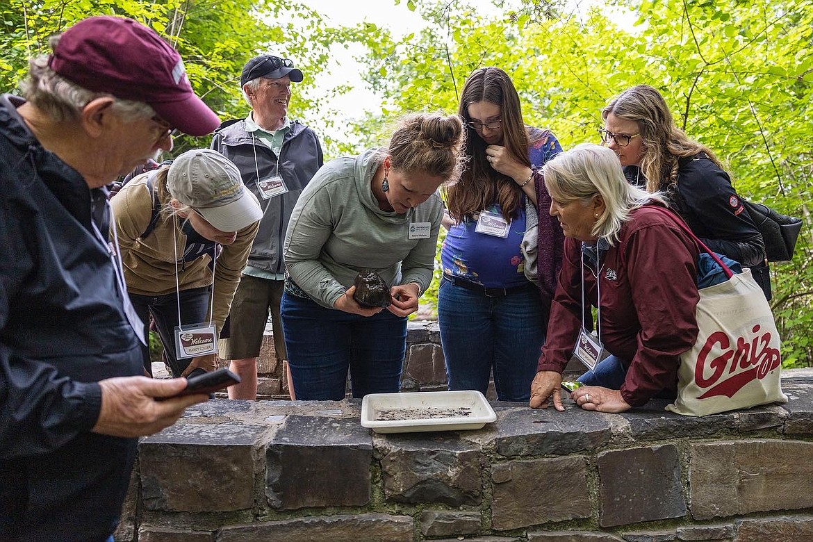 Flathead Lake Biological Station assistant research professor Rachel Malison (center) leads an immersive FLBS Monitoring Montana Waters freshwater science experience for University of Montana alumni. Photo courtesy the University of Montana Alumni Association.