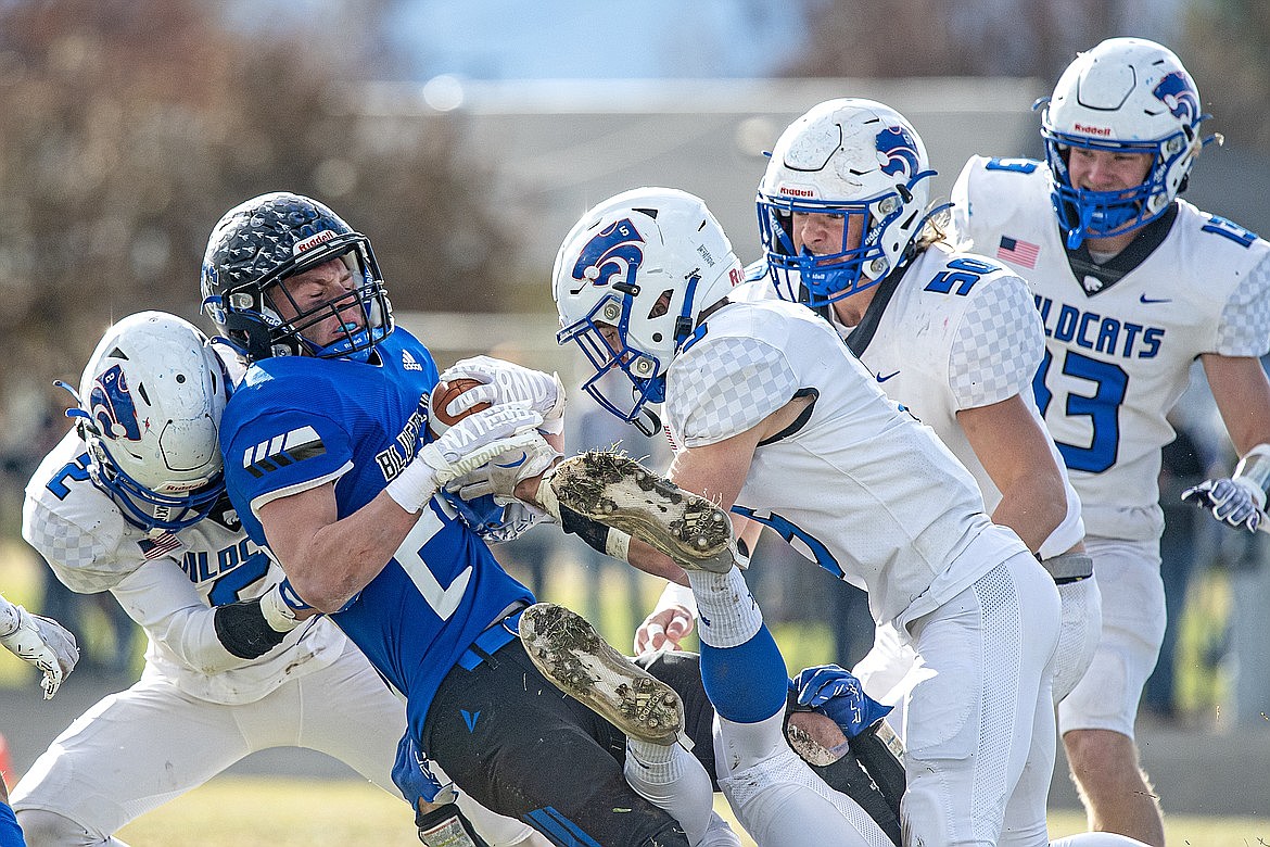 Wildcats Austin Dodson, Mark Robison, Hunter Goodman and Alihn Anderson stop Blue Devil Logan Avery in his tracks Saturday, Nov. 11. (Avery Howe photo)