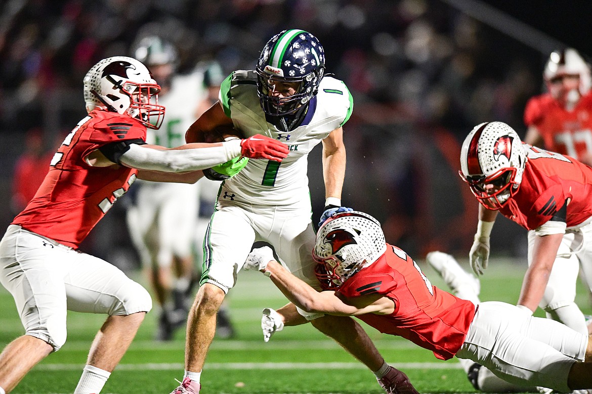 Glacier wide receiver Cohen Kastelitz (1) picks up yardage after a reception in the first half against Bozeman in the Class AA state championship at Van Winkle Stadium on Friday, Nov. 17. (Casey Kreider/Daily Inter Lake)