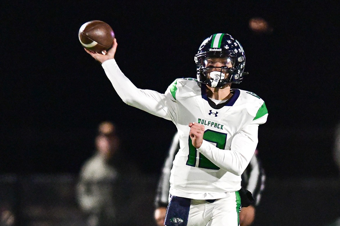 Glacier quarterback Jackson Presley (12) drops back to pass in the first quarter against Bozeman in the Class AA state championship at Van Winkle Stadium on Friday, Nov. 17. (Casey Kreider/Daily Inter Lake)