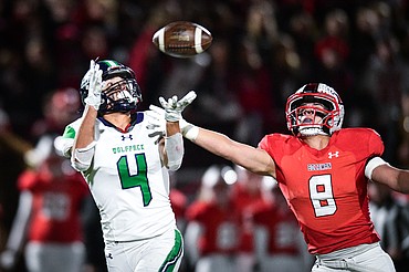 Glacier wide receiver Kole Johnson (4) holds on to a 33-yard reception in the second quarter against Bozeman in the Class AA state championship at Van Winkle Stadium on Friday, Nov. 17. (Casey Kreider/Daily Inter Lake)