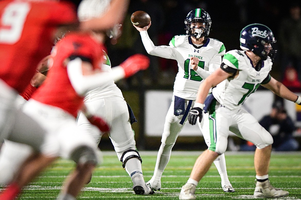 Glacier quarterback Jackson Presley (12) drops back to pass in the third quarter against Bozeman in the Class AA state championship at Van Winkle Stadium on Friday, Nov. 17. (Casey Kreider/Daily Inter Lake)