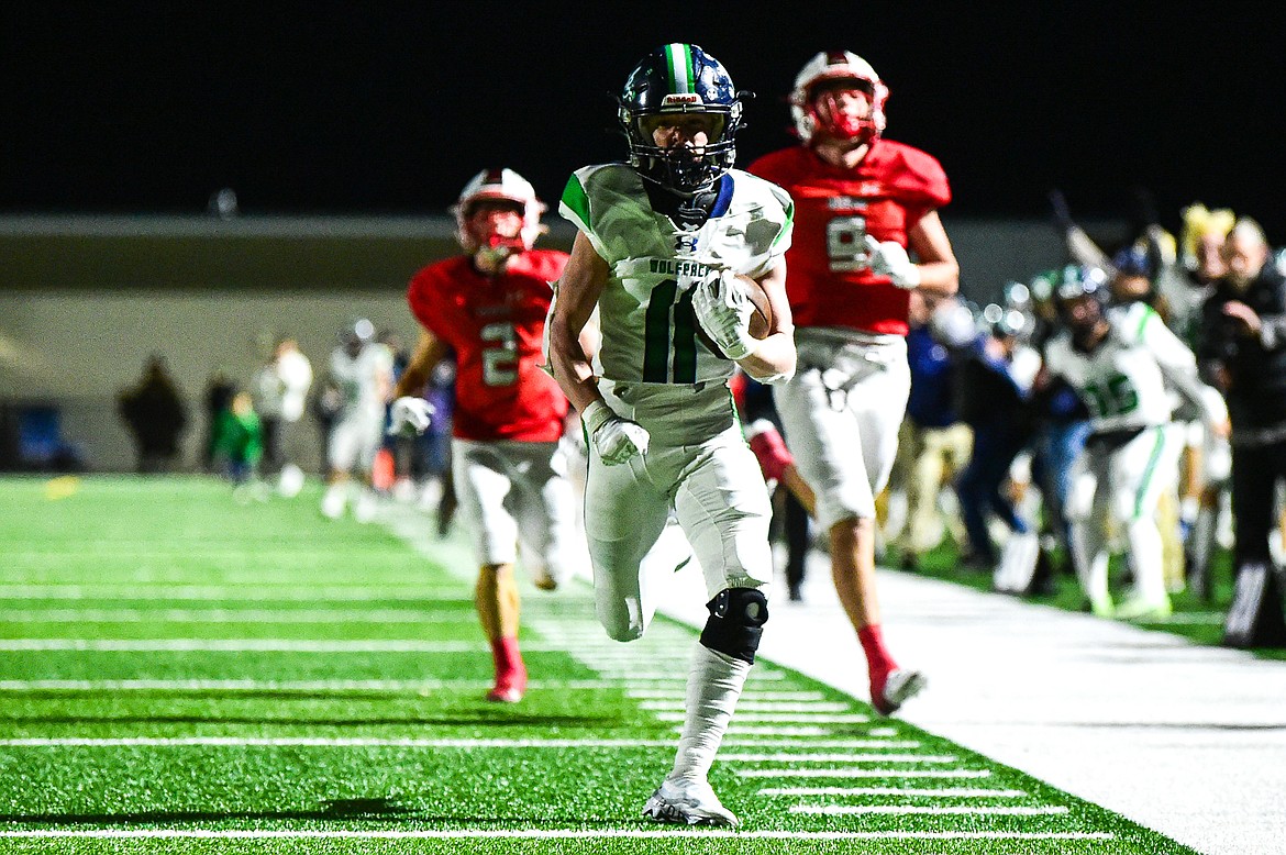Glacier wide receiver Rhett Measure (11) scores a touchdown on a 76-yard reception in the fourth quarter against Bozeman in the Class AA state championship at Van Winkle Stadium on Friday, Nov. 17. (Casey Kreider/Daily Inter Lake)